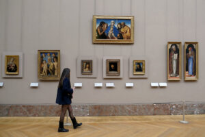 Interior view of the Louvre Museum, showcasing its grand architecture and art displays in Paris, France's largest museum