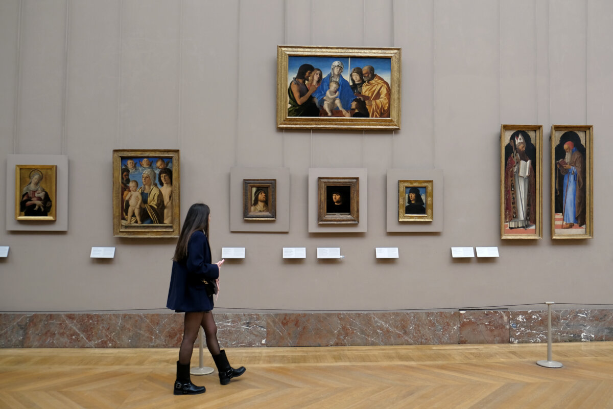 Interior view of the Louvre Museum, showcasing its grand architecture and art displays in Paris, France's largest museum