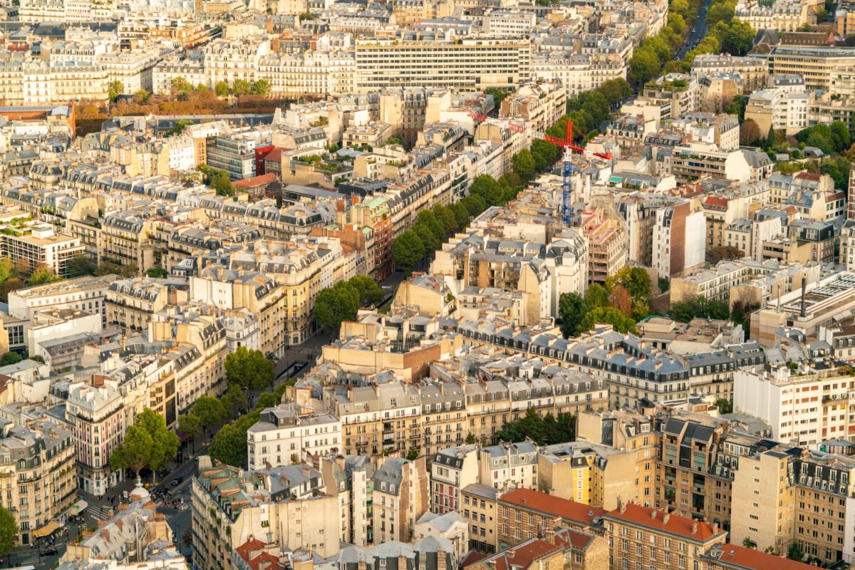 Aerial view of the 14th Arrondissement in Paris, showcasing residential buildings and tree-lined streets.