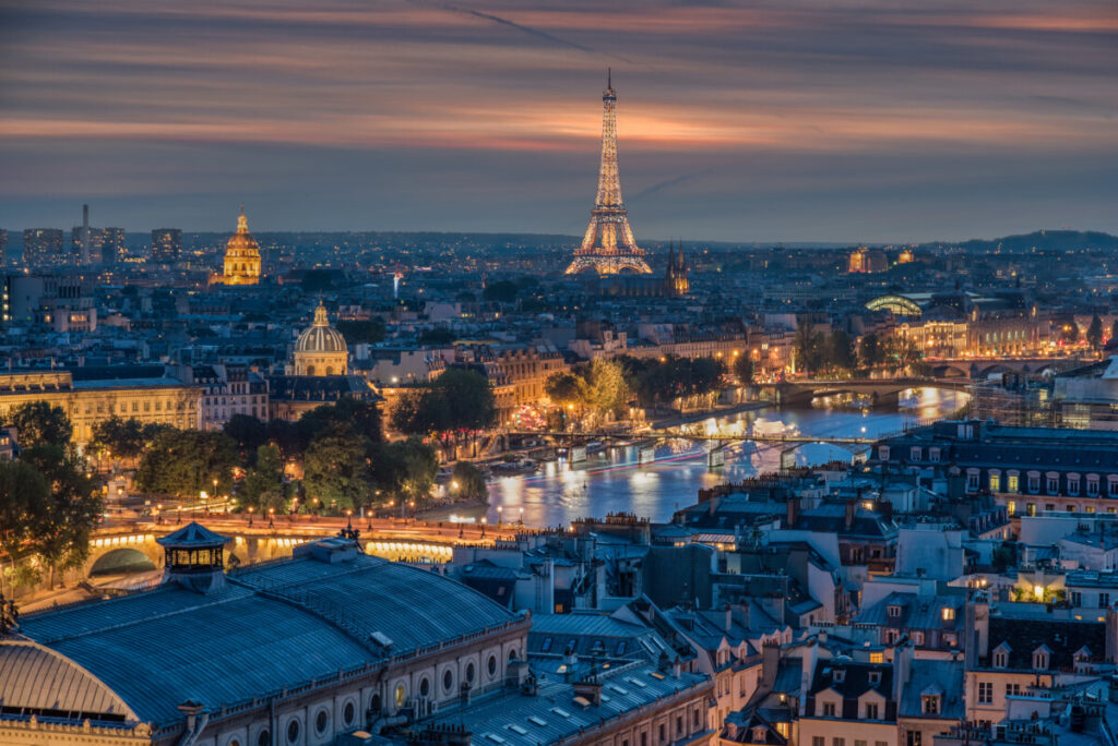 Aerial view of Paris, France at night and night lights