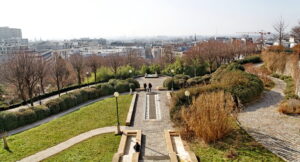 Bird's-eye view of Parc de Belleville in Paris, highlighting its expansive green spaces and scenic layout within the city