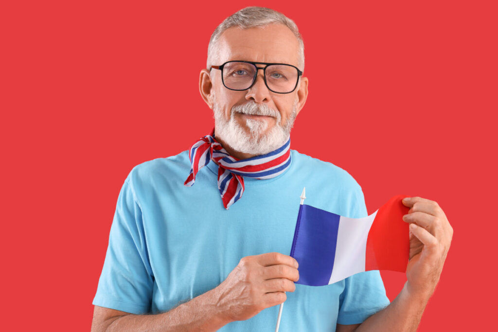 Senior Parisian Man with flag of France