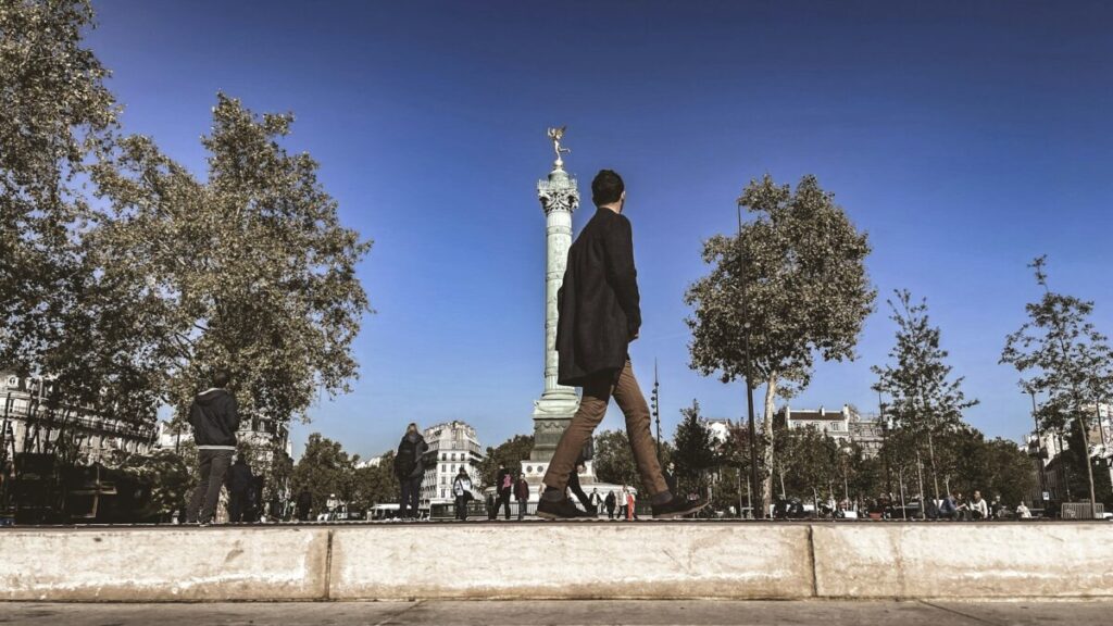 Tourists walking at Place de la Bastille, Paris, France