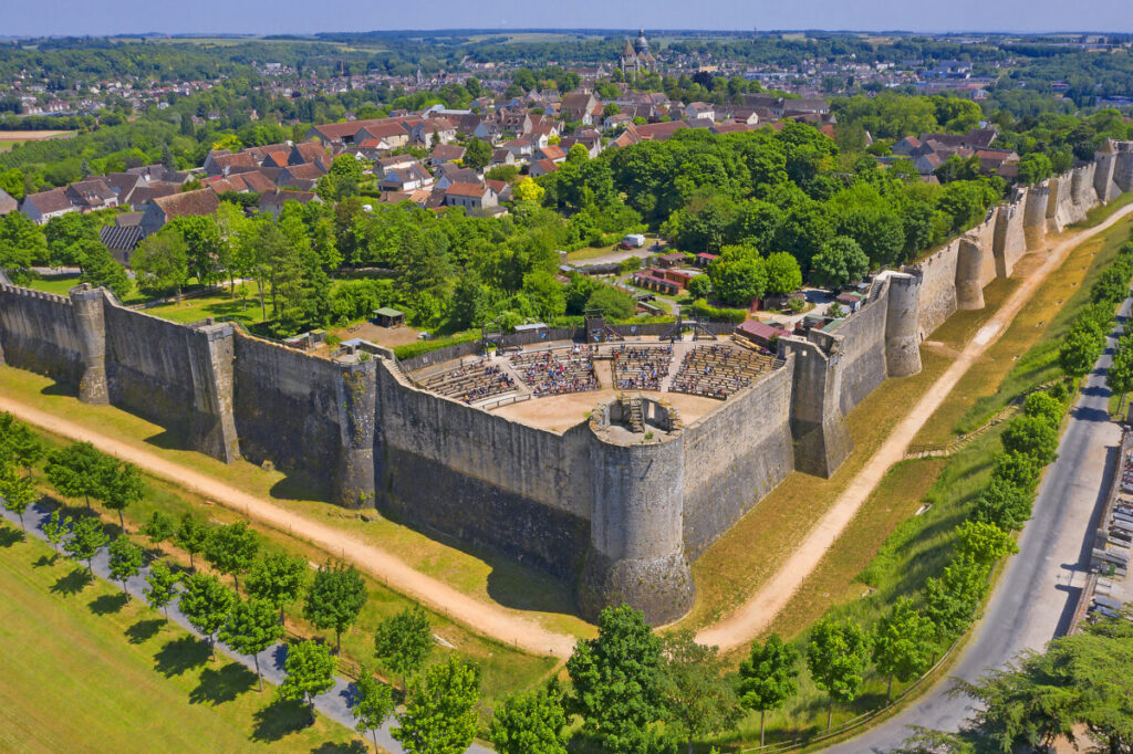 Historic city walls of Provins, France, showcasing medieval architecture, part of a UNESCO World Heritage Site.
