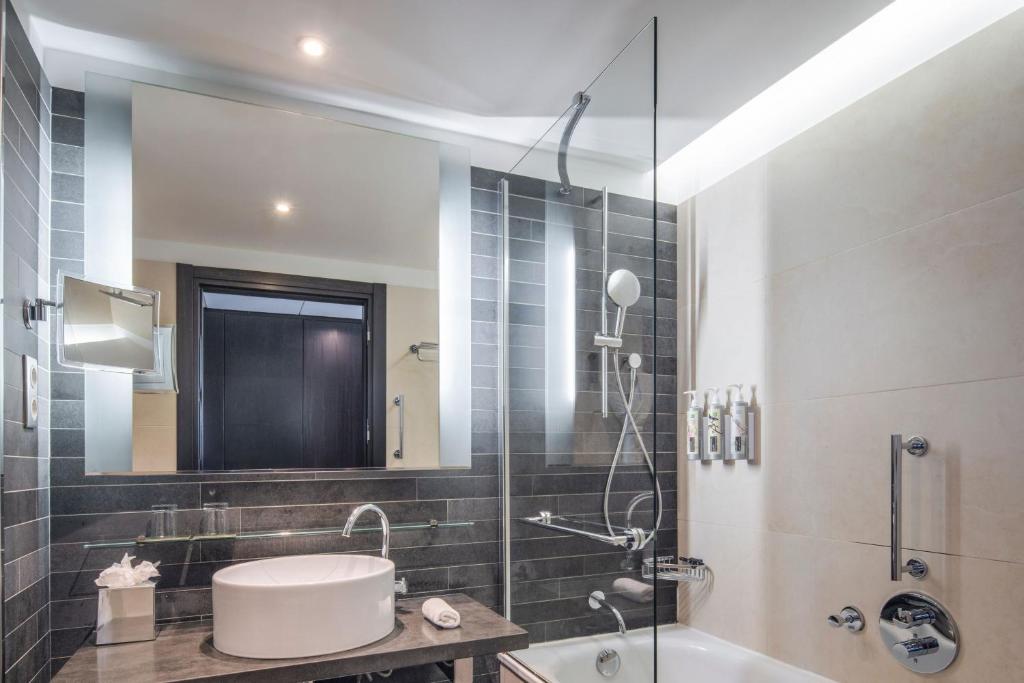 "Renaissance Paris Arc de Triomphe Hotel offers a wealth of amenities, including a rooftop terrace with stunning views, a fitness center for wellness enthusiasts, and a stylish on-site restaurant.