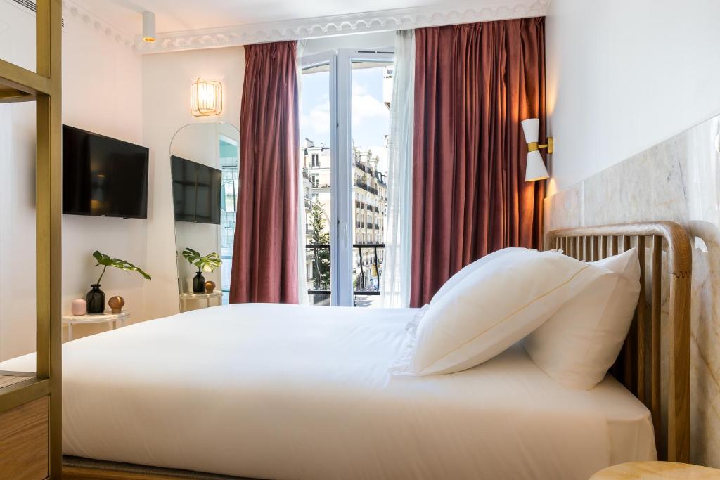 Hotel Rose Bourbon offers well-appointed rooms designed to provide comfort and convenience for guests during their stay.