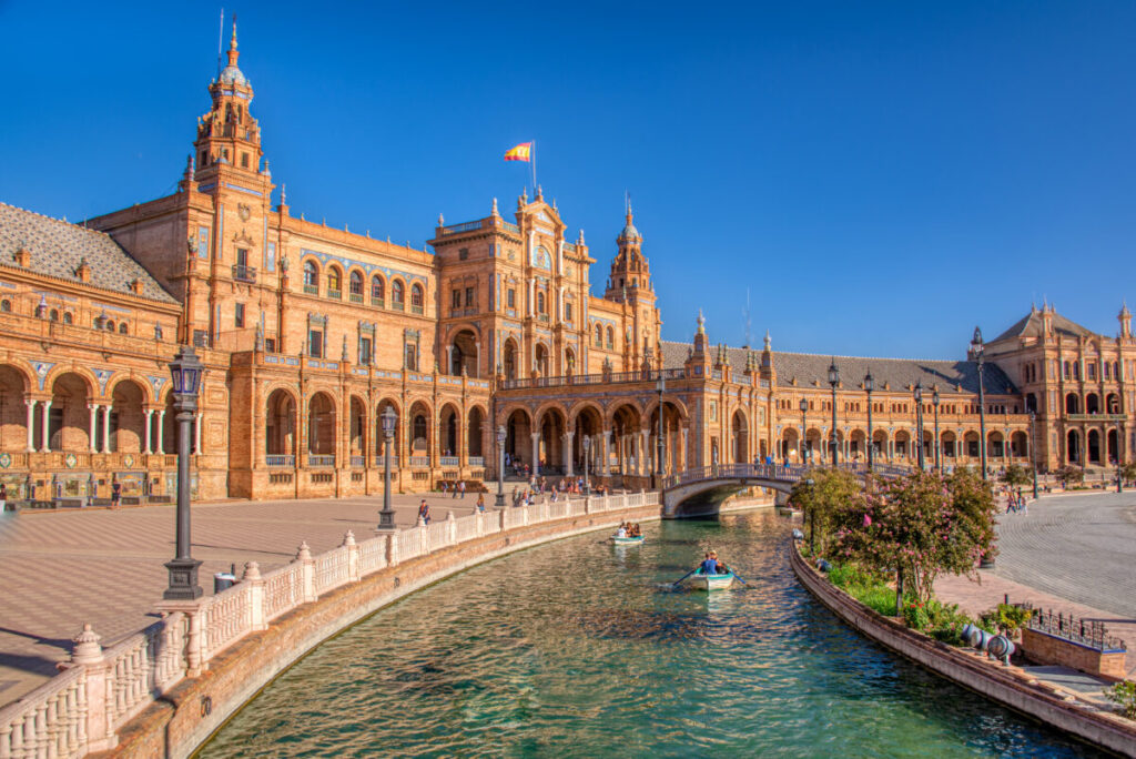 Stunning Plaza de España in Seville, featuring intricate tile work and a grand semi-circular building