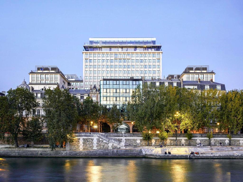 The SO/ Paris Hotel, located along the riverbank in Paris, France, offers picturesque views of the water.