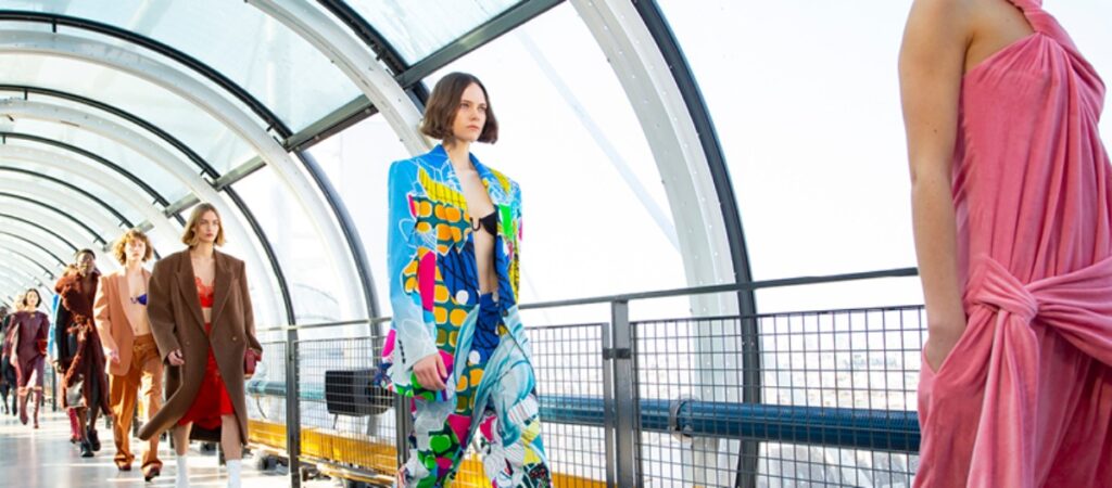 Models wearing the Stella McCartney clothes on a fashion show runway