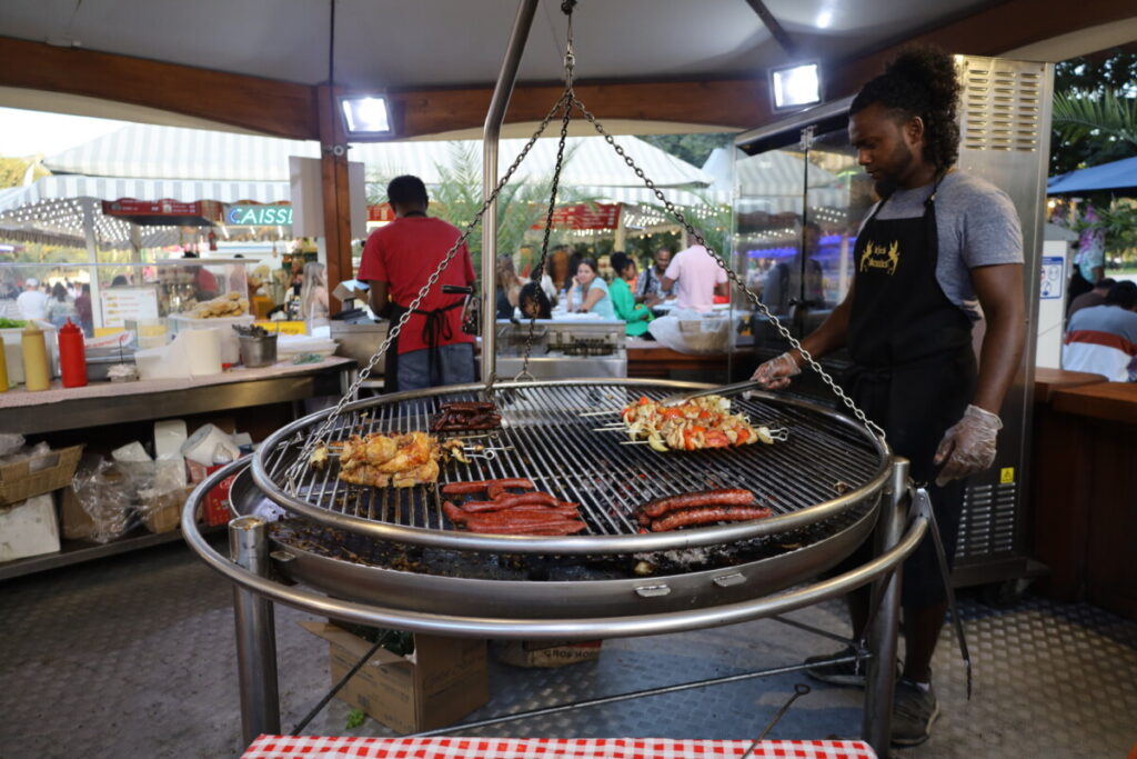 Barbecue food stand during a fun fair at Tuileries Garden in Paris, France