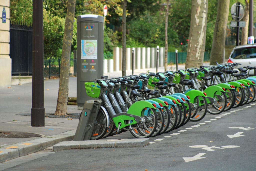 Velib bike rental station in Paris, featuring rows of bicycles