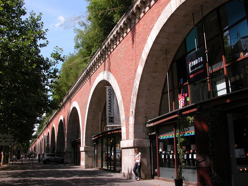 Brick building of Viaduc Des Arts in Paris, showcasing classic architecture and urban design.